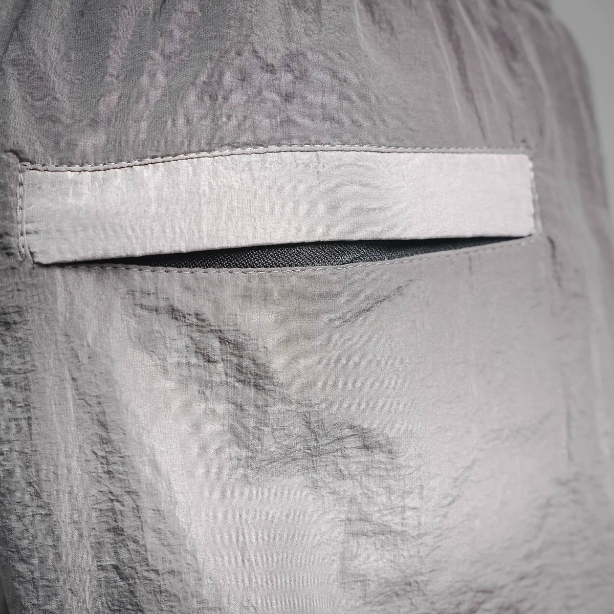 Stone Island light gray shorts back yoke with stitched pocket opening