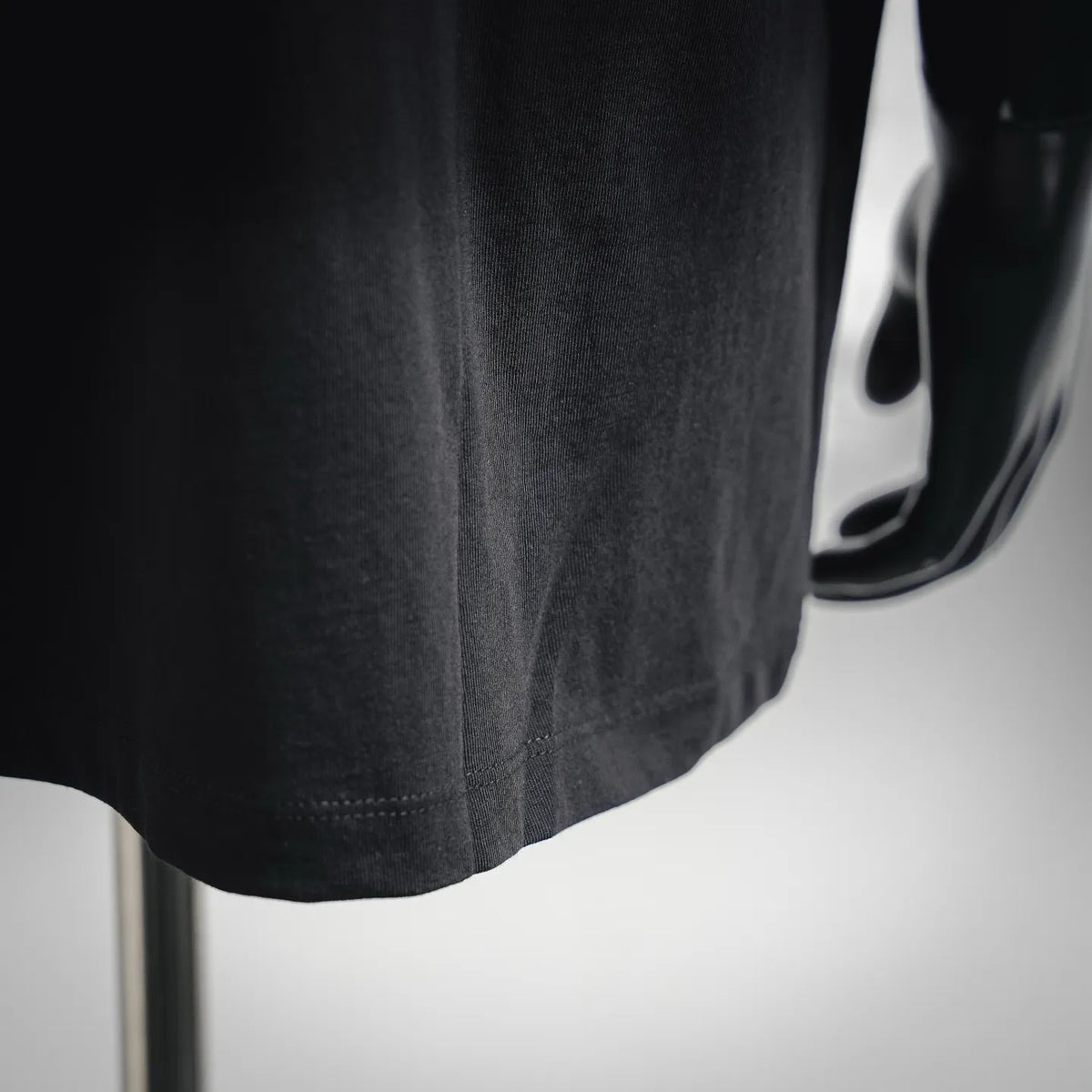 Men's black Stone Island T-shirt lower front close-up