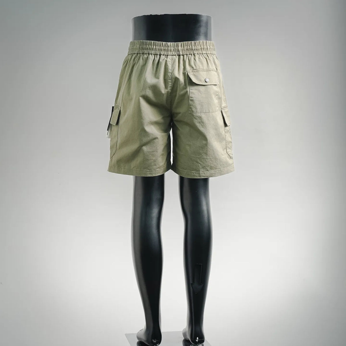 Olive cargo shorts with elastic waistband and rear patch pocket