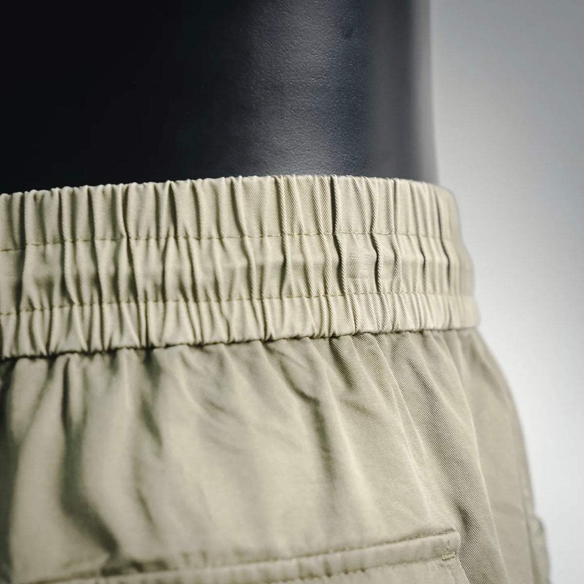 Olive shorts elastic waistband with stitched seam detail