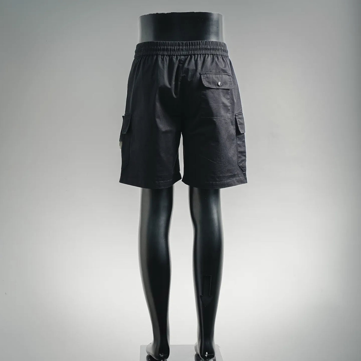Black cargo shorts with elastic waist and back flap pocket