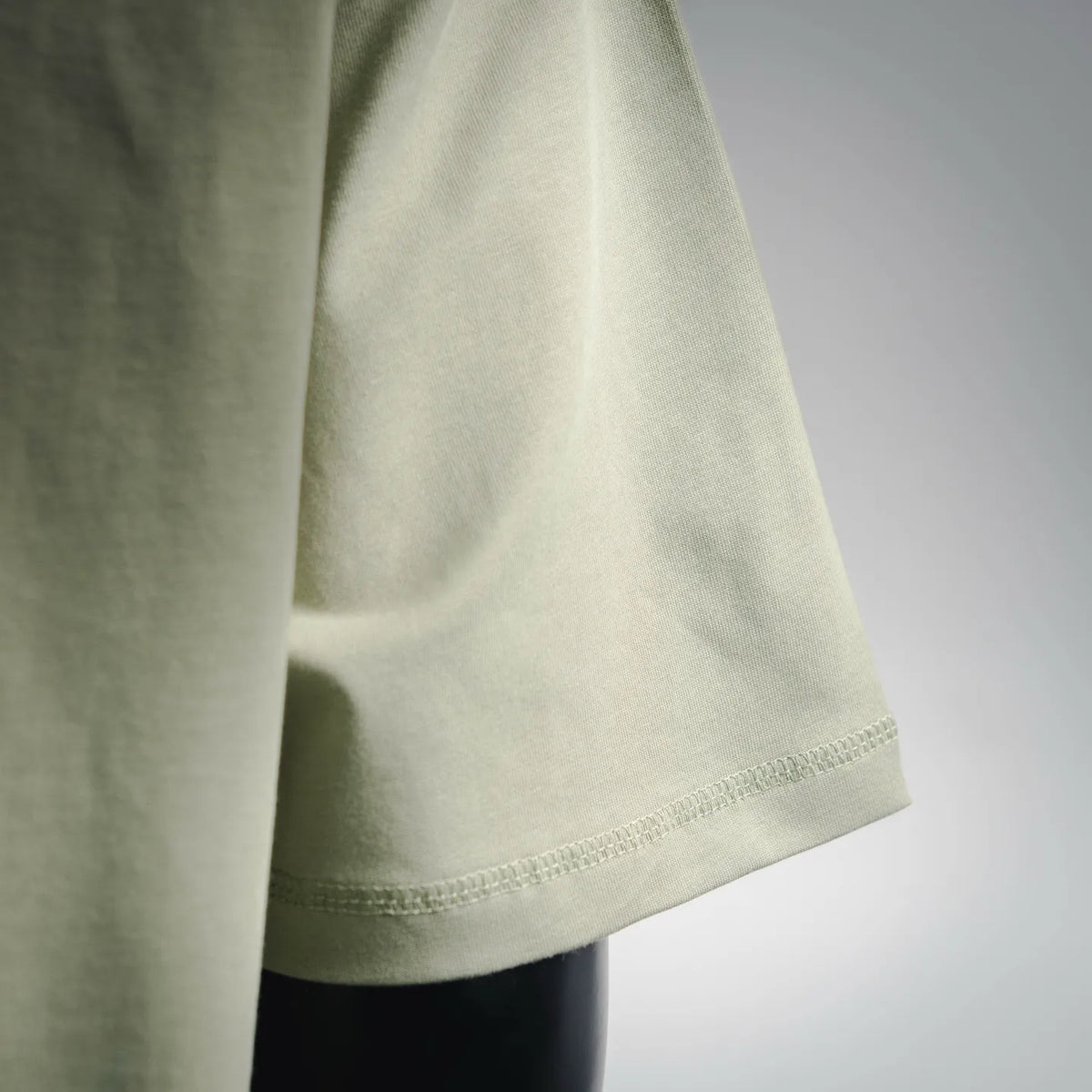 Stone Island short-sleeve T-shirt side seam and curved hem, light green