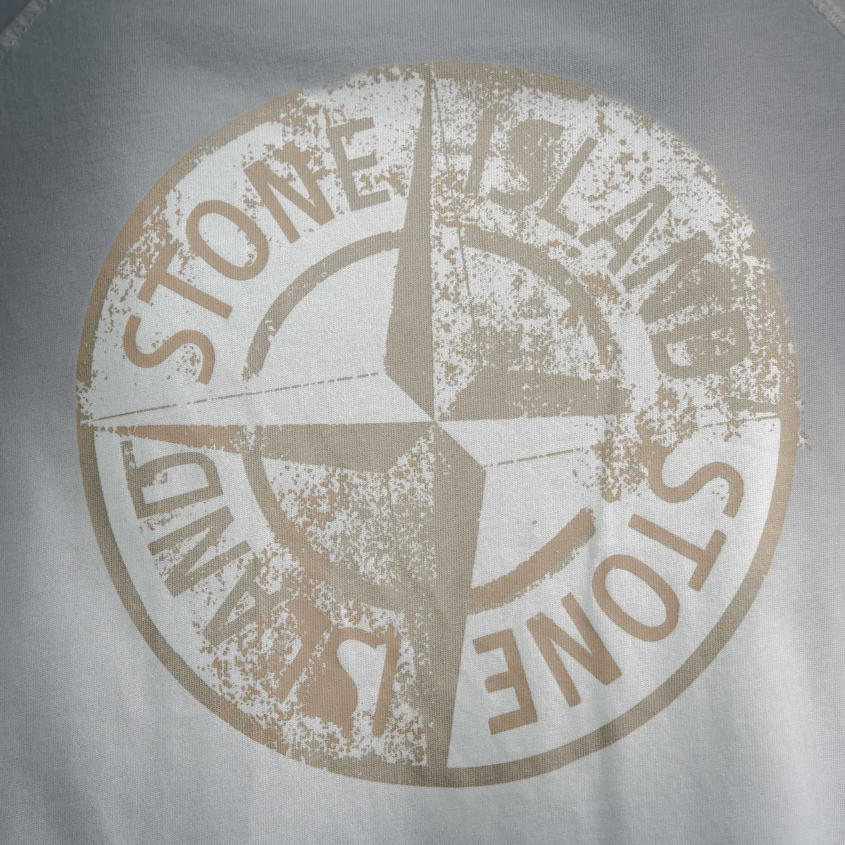 White T-shirt with distressed Stone Island circular back print