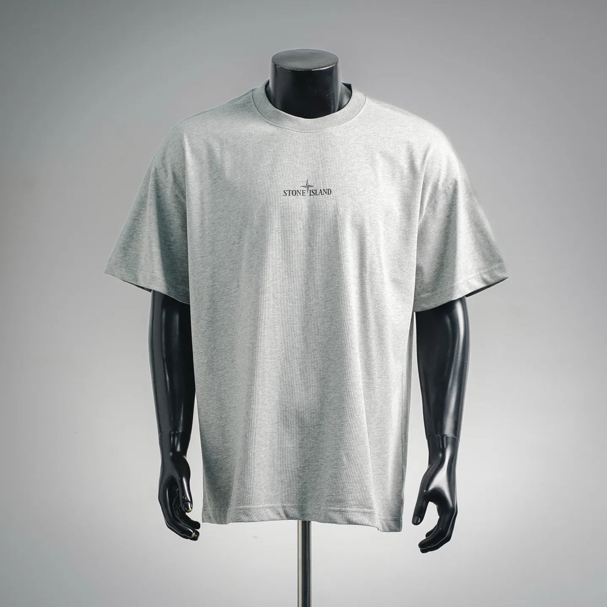 Light gray short-sleeve T-shirt with small front Stone Island logo