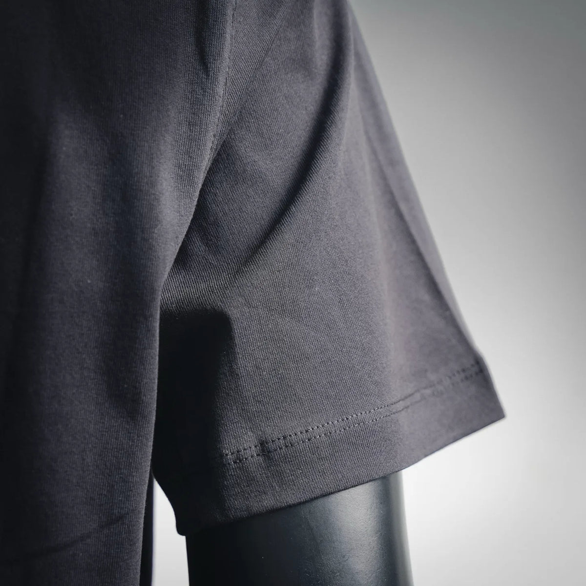 Stone Island short-sleeve T-shirt sleeve detail, dark gray cuff and hem