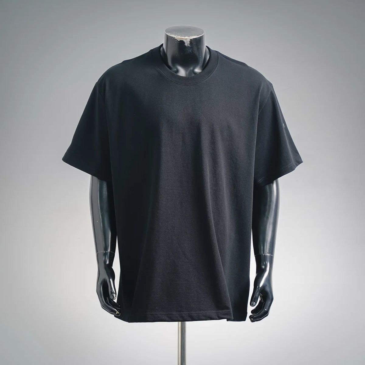 Black short-sleeve crewneck T-shirt on mannequin