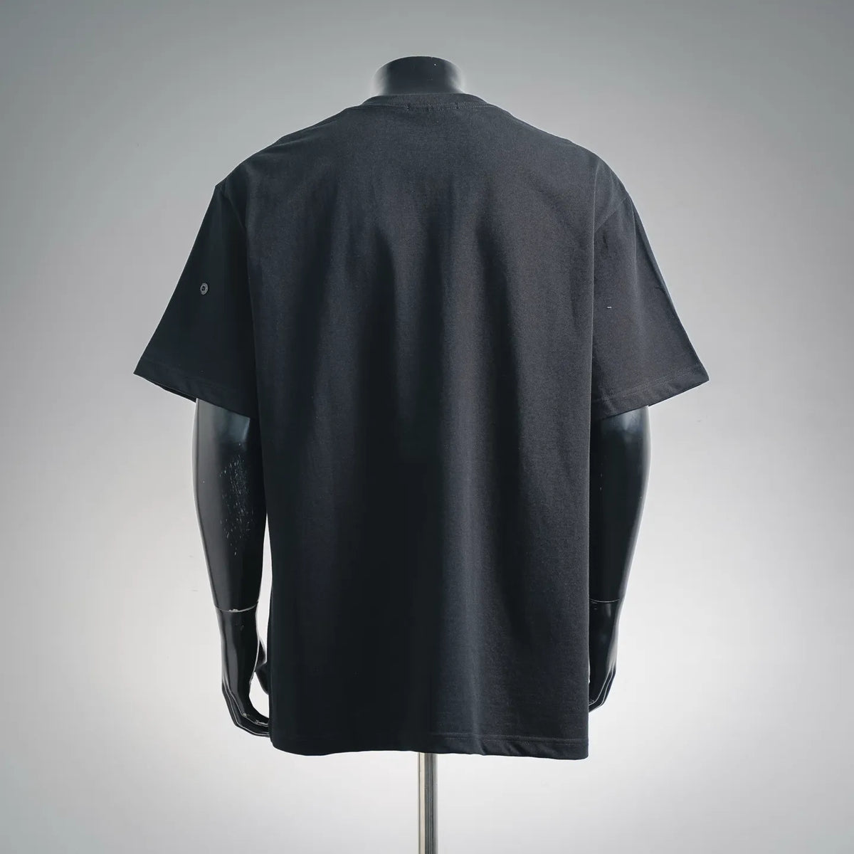 Black short-sleeve crewneck T-shirt back view on mannequin