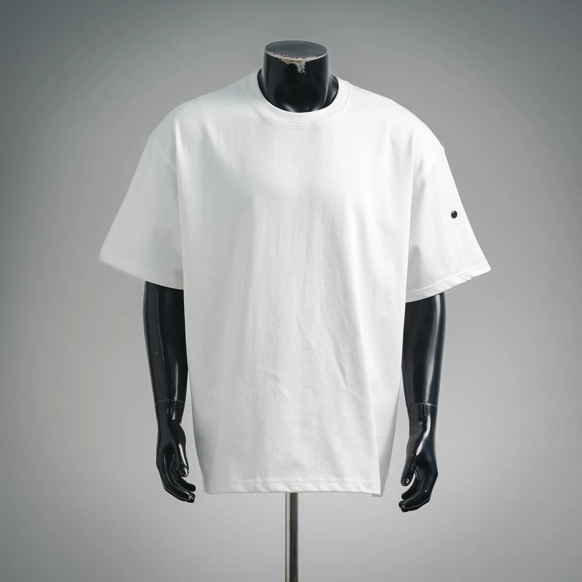 White crewneck short-sleeve T-shirt with side black eyelet details
