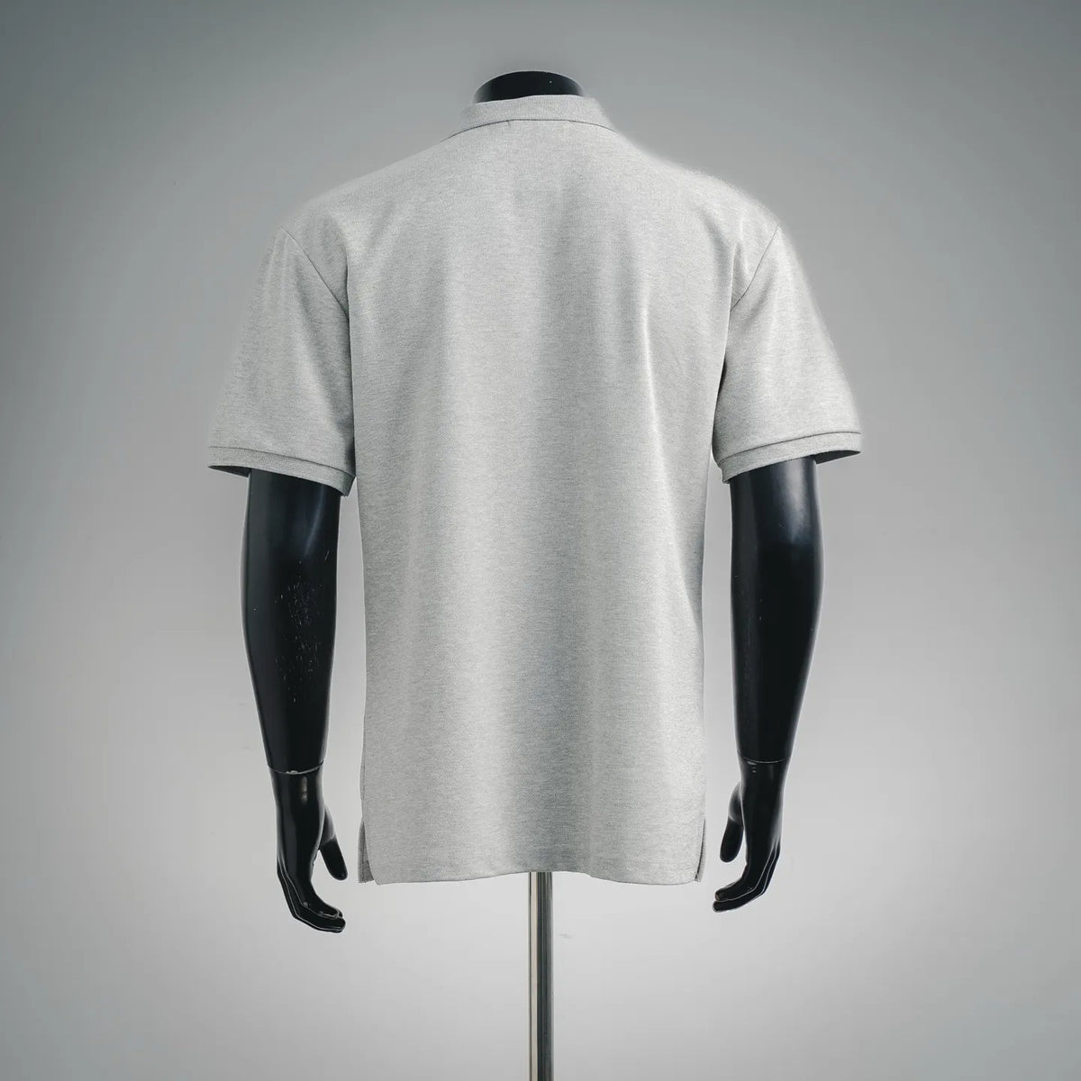 Light gray short-sleeve polo shirt, back view on mannequin with smooth solid design