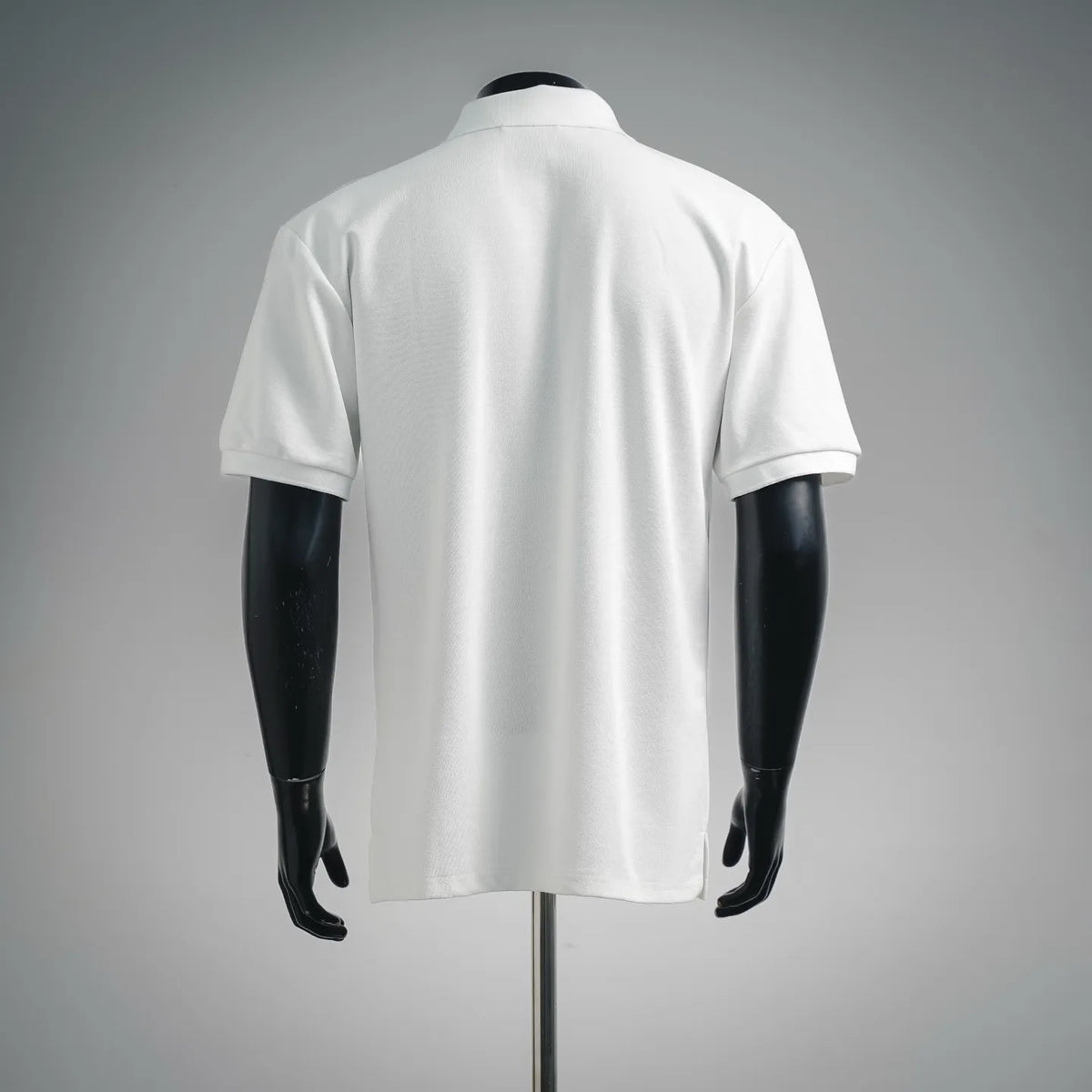 White short-sleeve polo shirt on a mannequin, back view