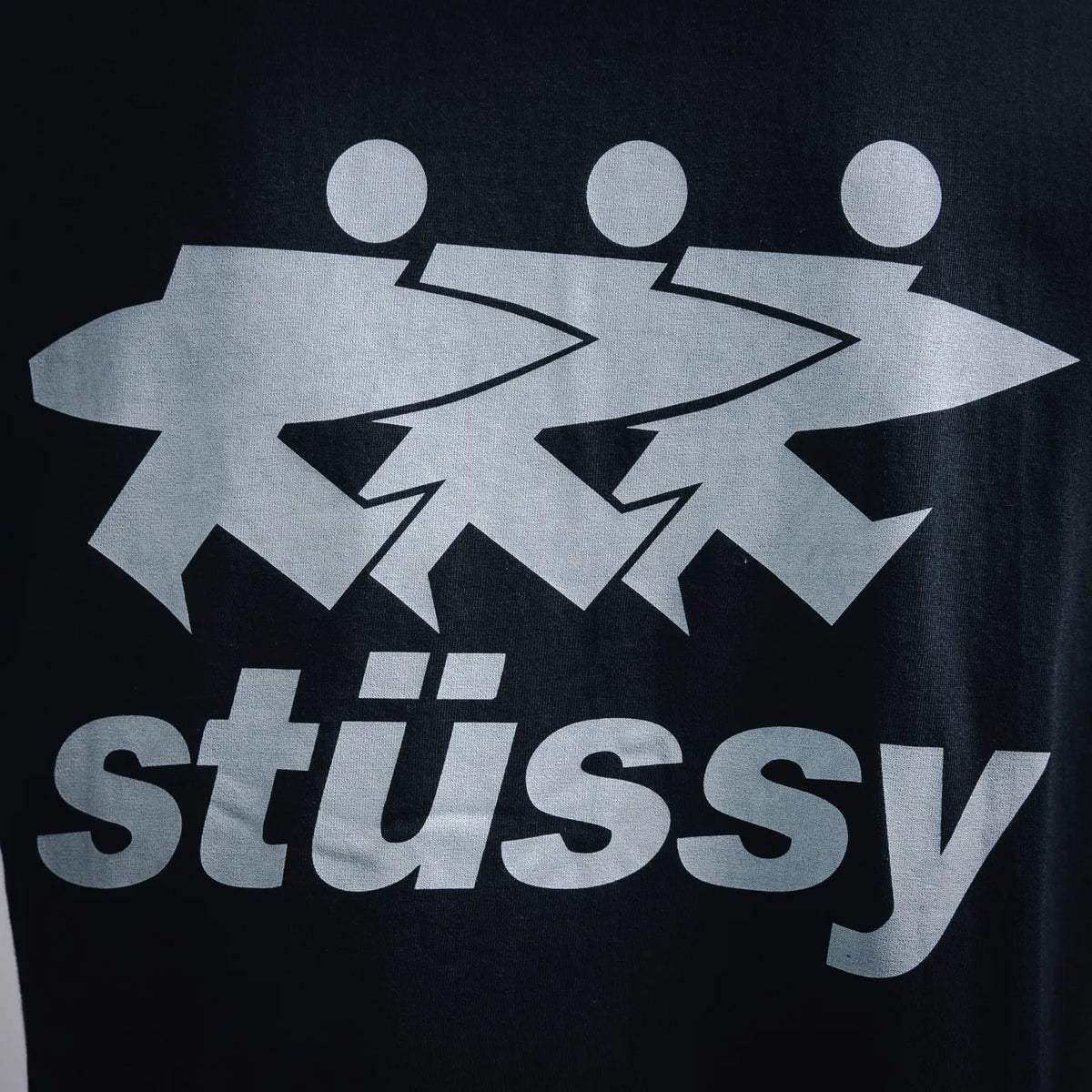 Stussy short-sleeve T-shirt front graphic with Stussy logo in light print