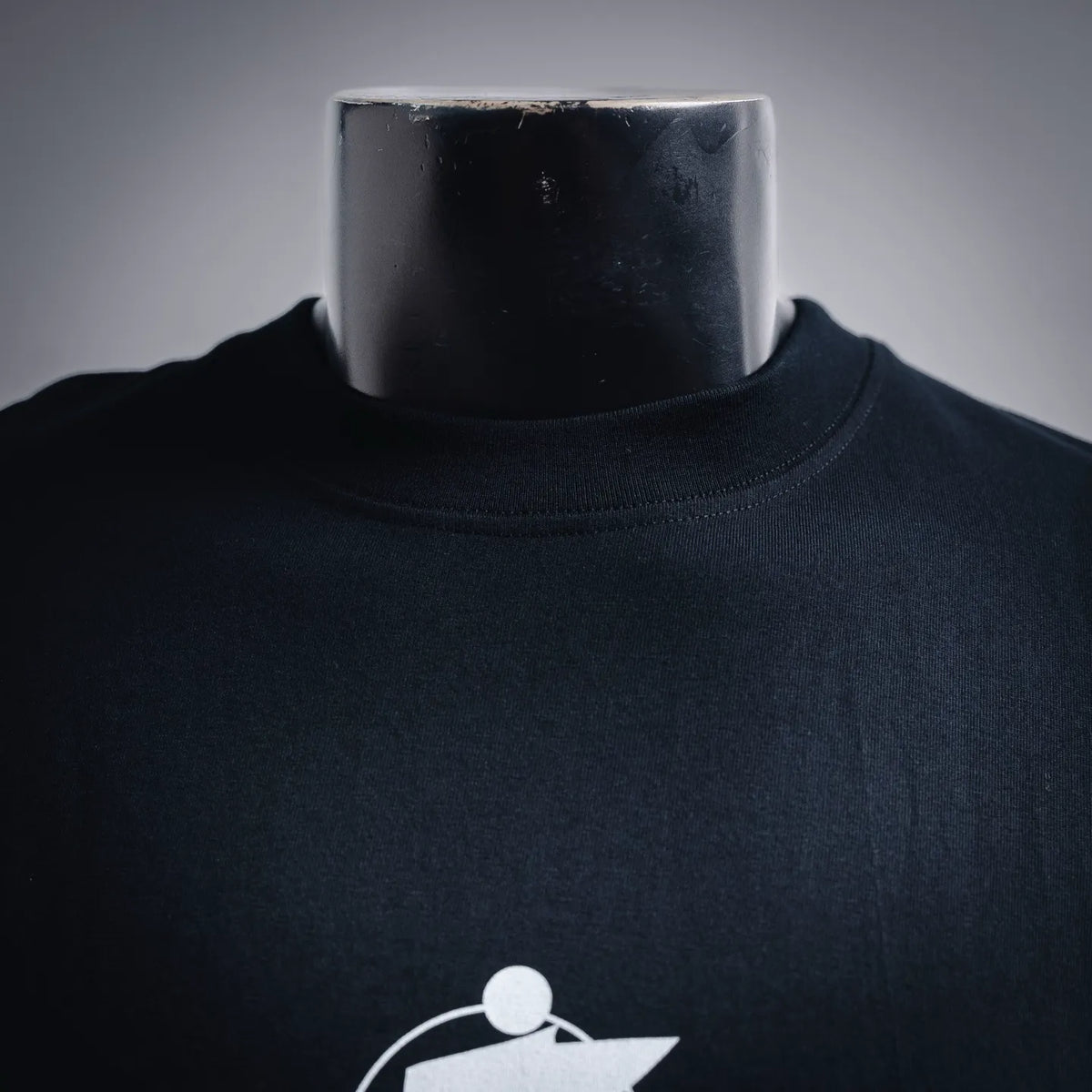 Stussy dark navy crewneck T-shirt with white logo graphic on the chest