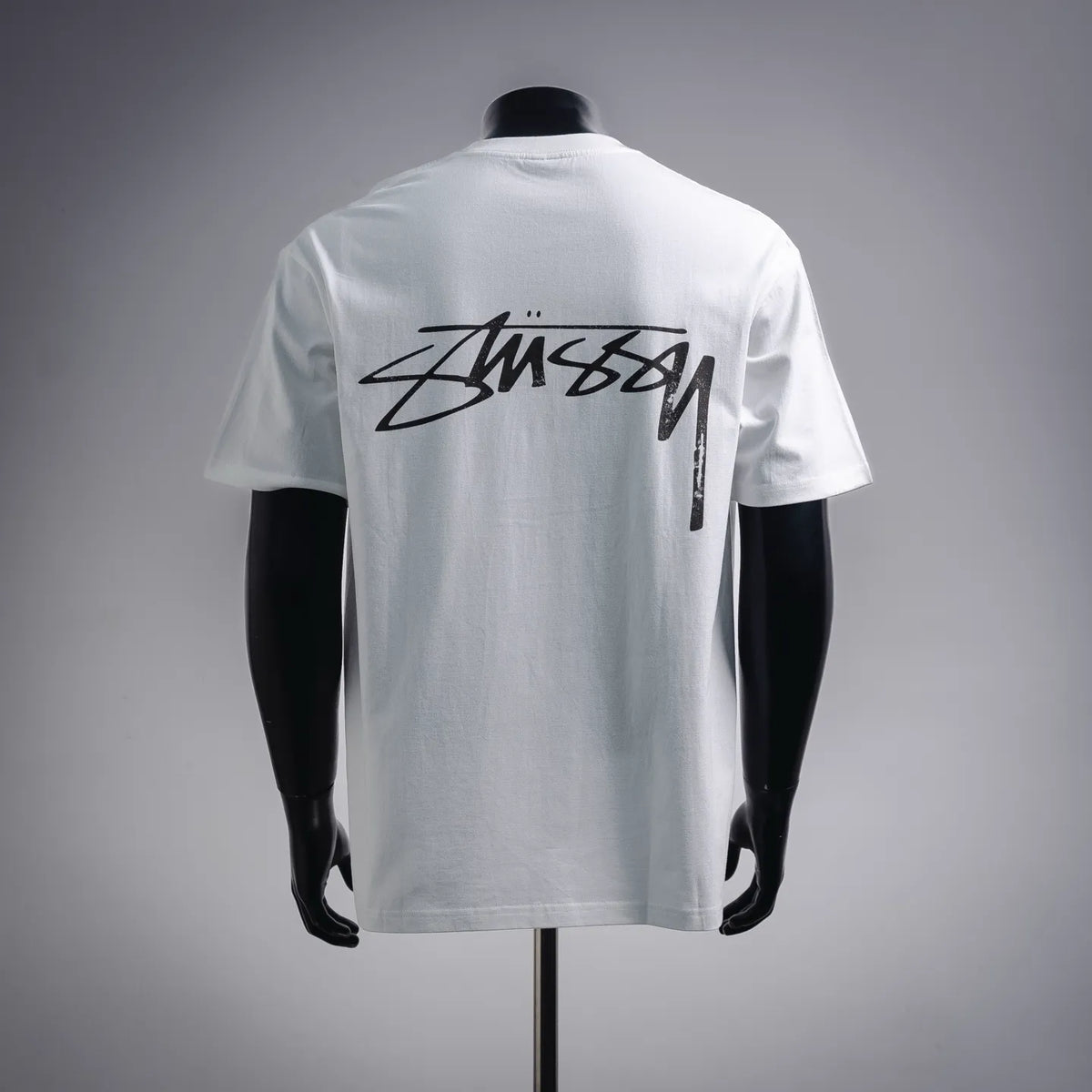 Stussy white T-shirt with back black script logo graphic