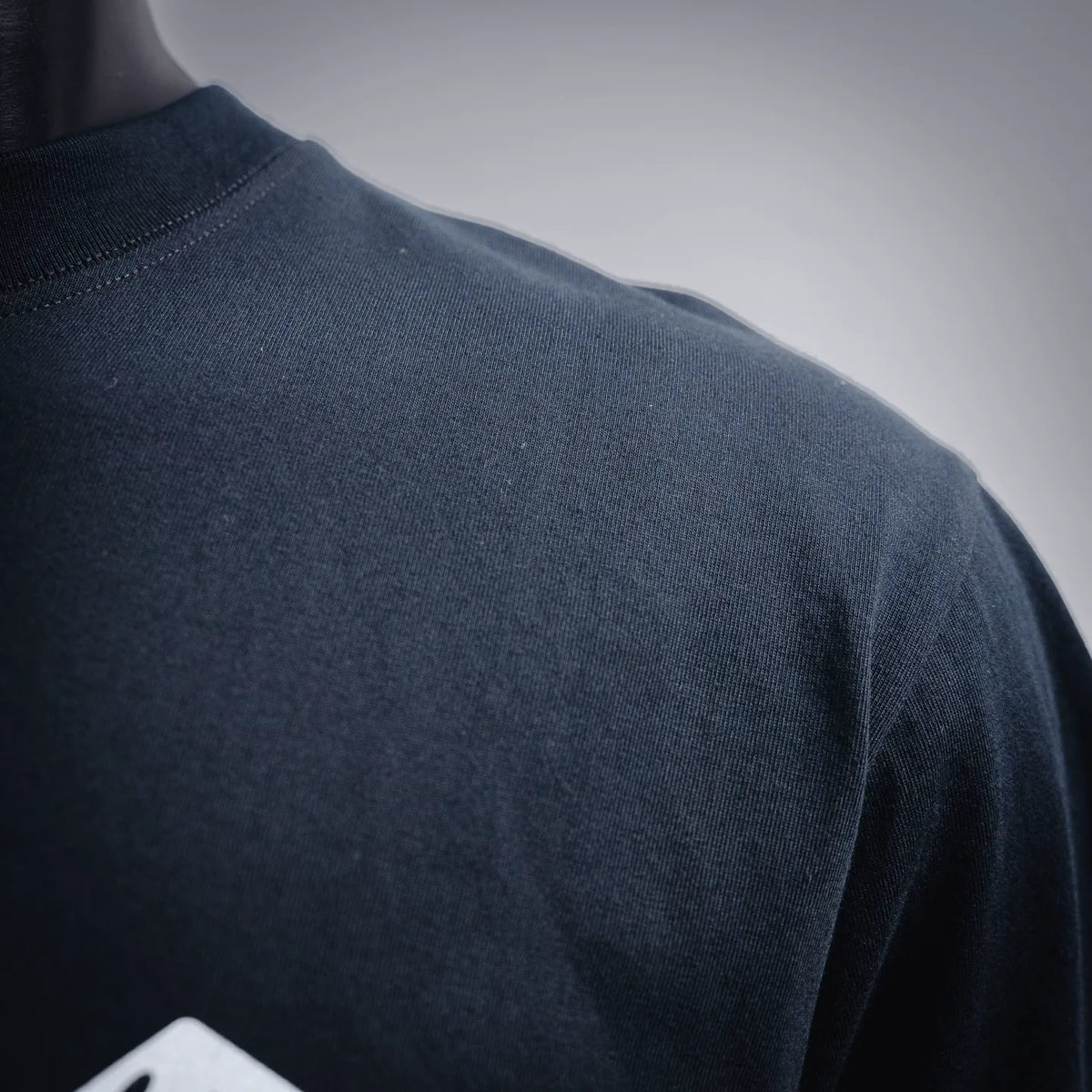 Black T-shirt fabric and shoulder yoke seam