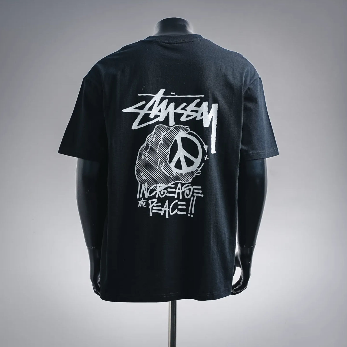 Black crew-neck T-shirt with large white back graphic print