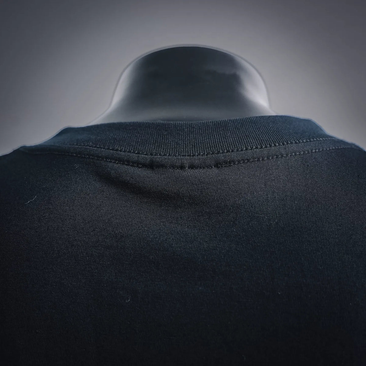 Black crew-neck T-shirt collar with ribbed neckline