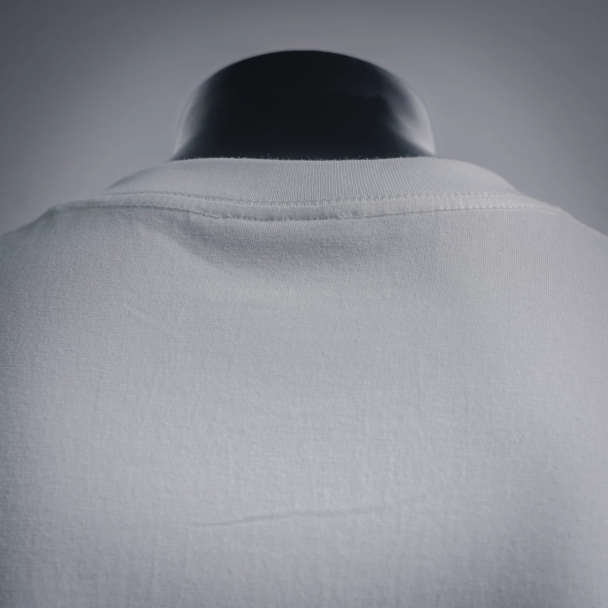 White crew-neck T-shirt collar detail, knit hem