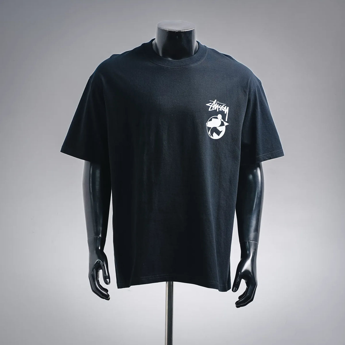 Black Stussy short-sleeve T-shirt with small front graphic logo