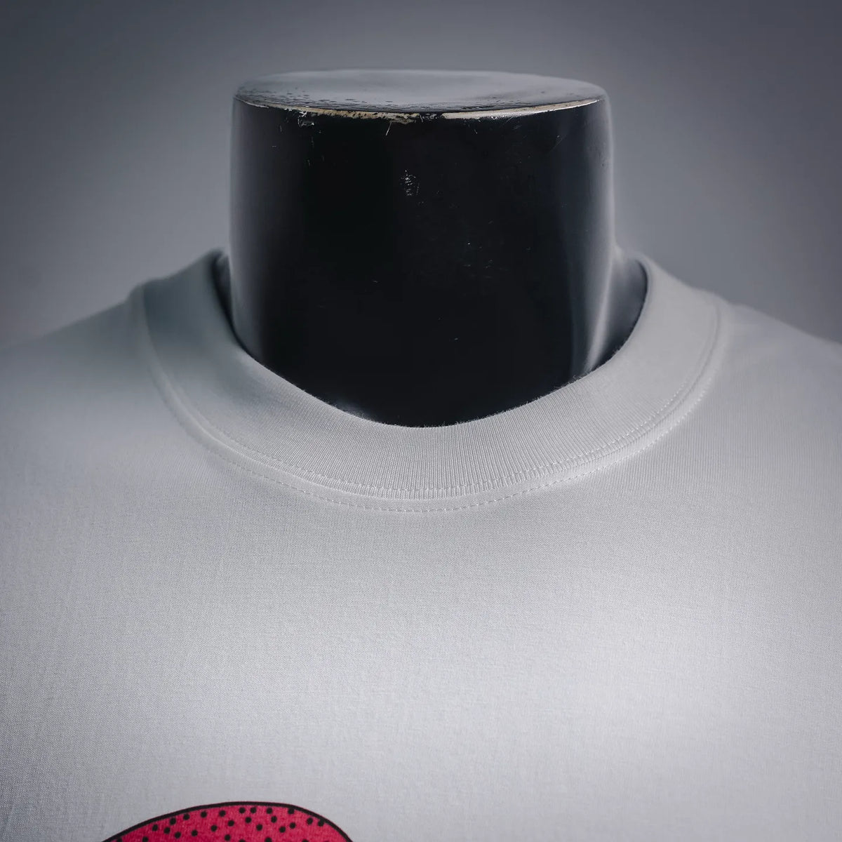 Stussy white short-sleeve T-shirt crew neck close-up