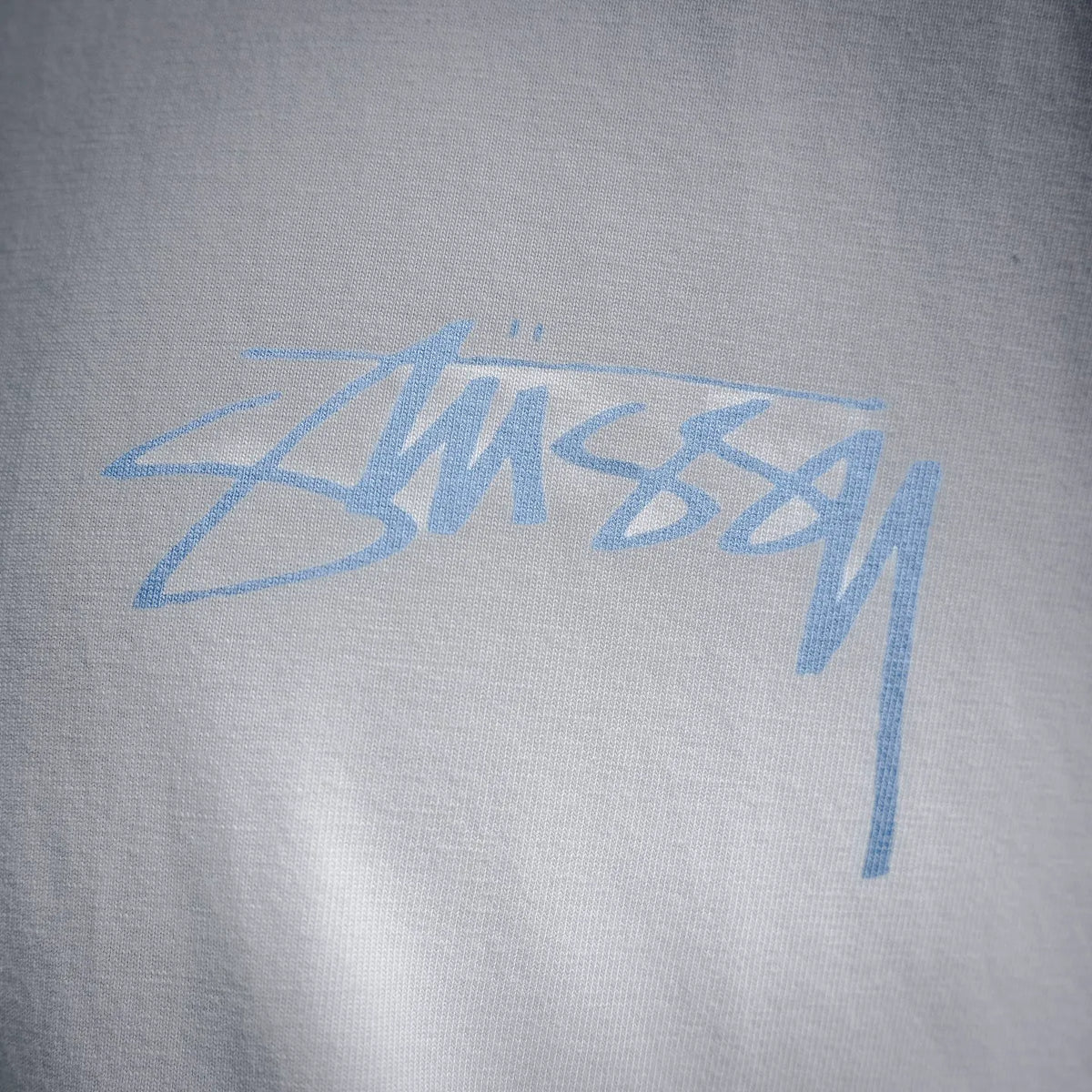 Stussy blue logo print on white short-sleeve T-shirt