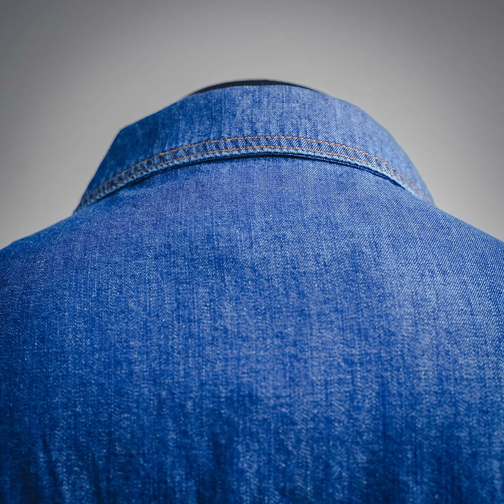 Denim jacket shoulder and upper back fabric close-up