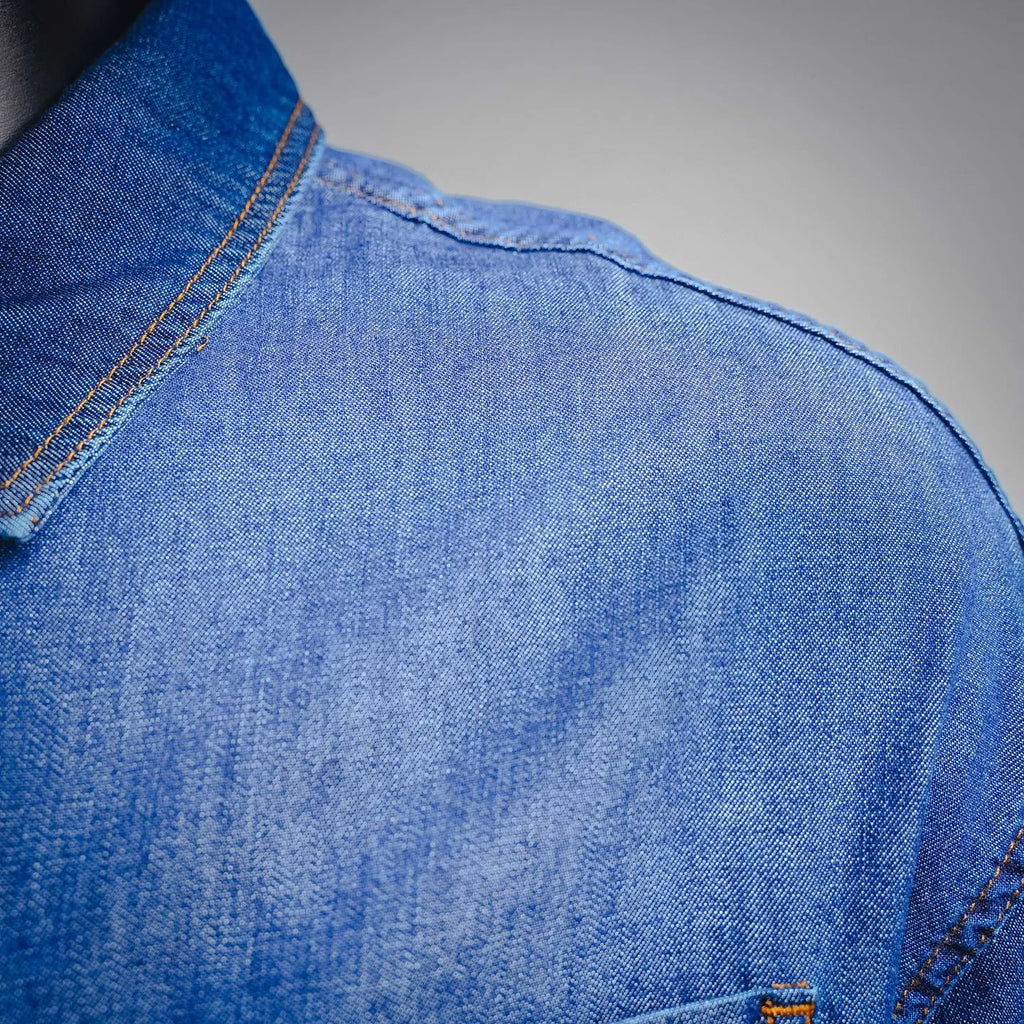 Denim jacket shoulder seam and collar edge stitching close-up