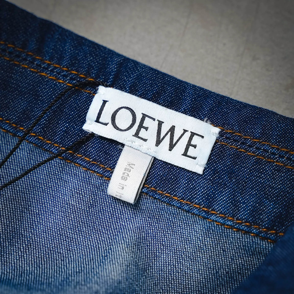 LOEWE denim jacket size label at interior waistband seam