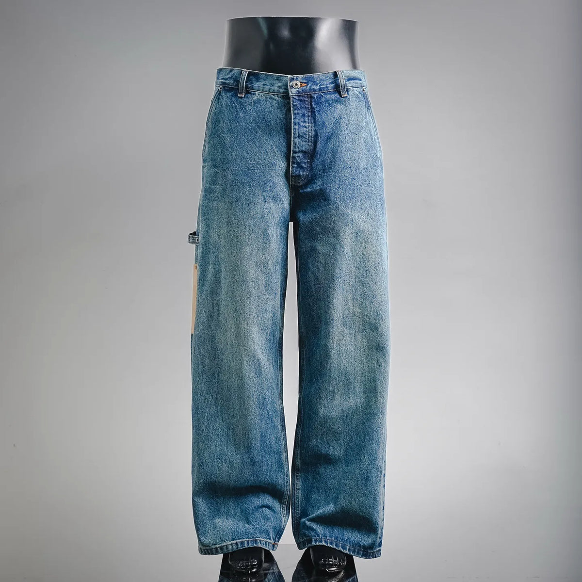 LOEWE denim pants, light blue wash with zip fly and wide straight legs.