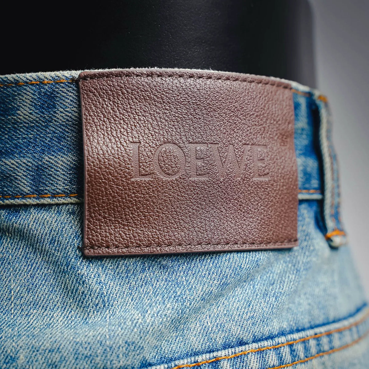 Tan leather LOEWE patch on back pocket