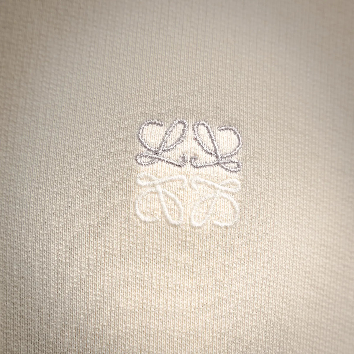 Embroidery logo on light cream LOEWE crewneck sweatshirt chest