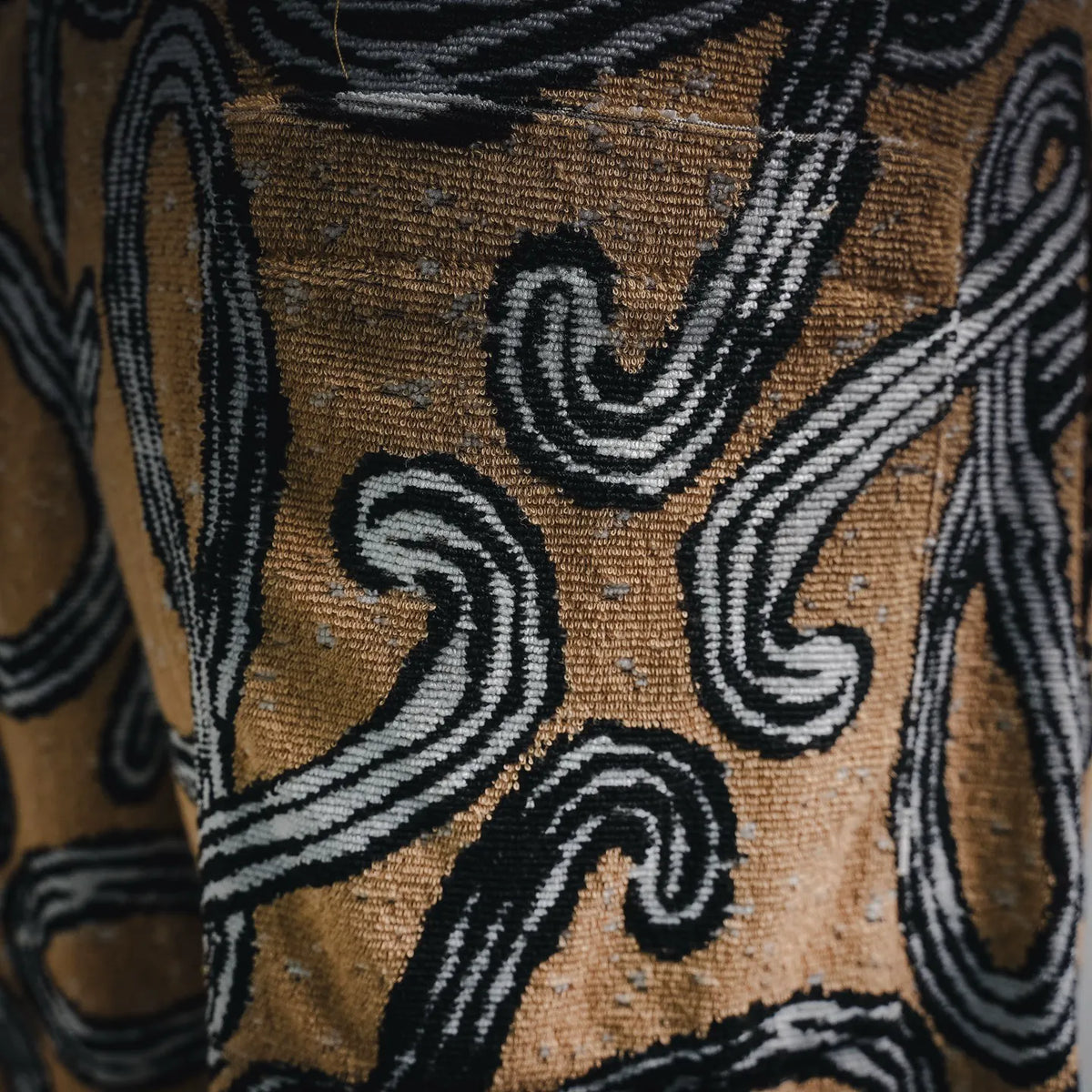 Close-up of tan and black woven pattern detail