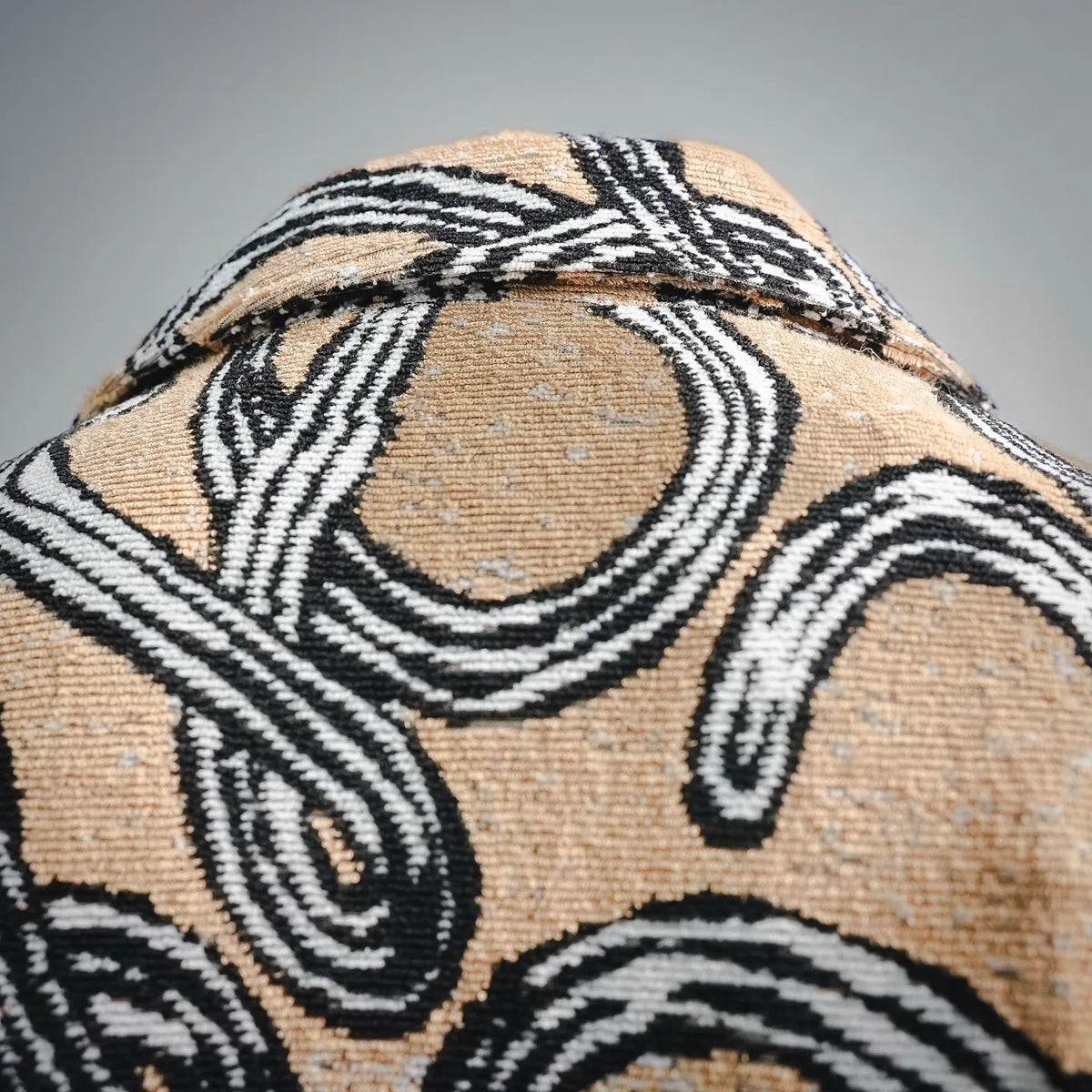 Abstract pattern on short-sleeve button-up shirt in black and tan