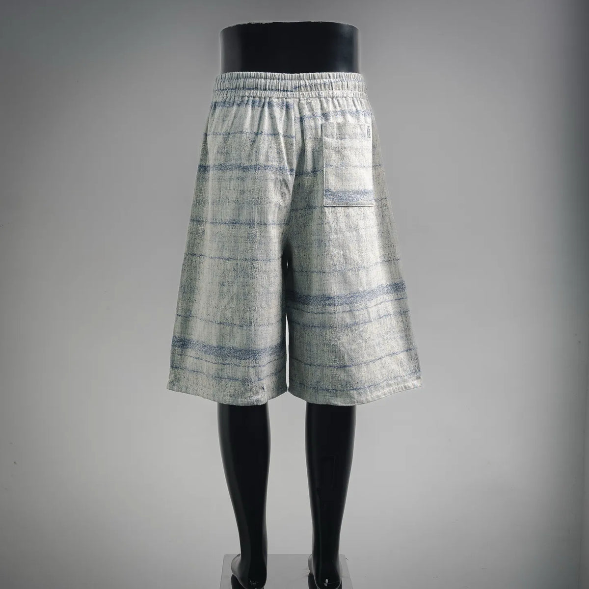 LOEWE light blue striped shorts with elastic waistband, rear view