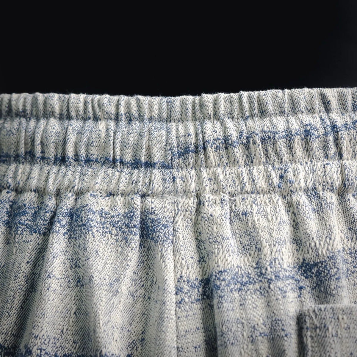 LOEWE striped shorts waistband close-up with gathered elastic