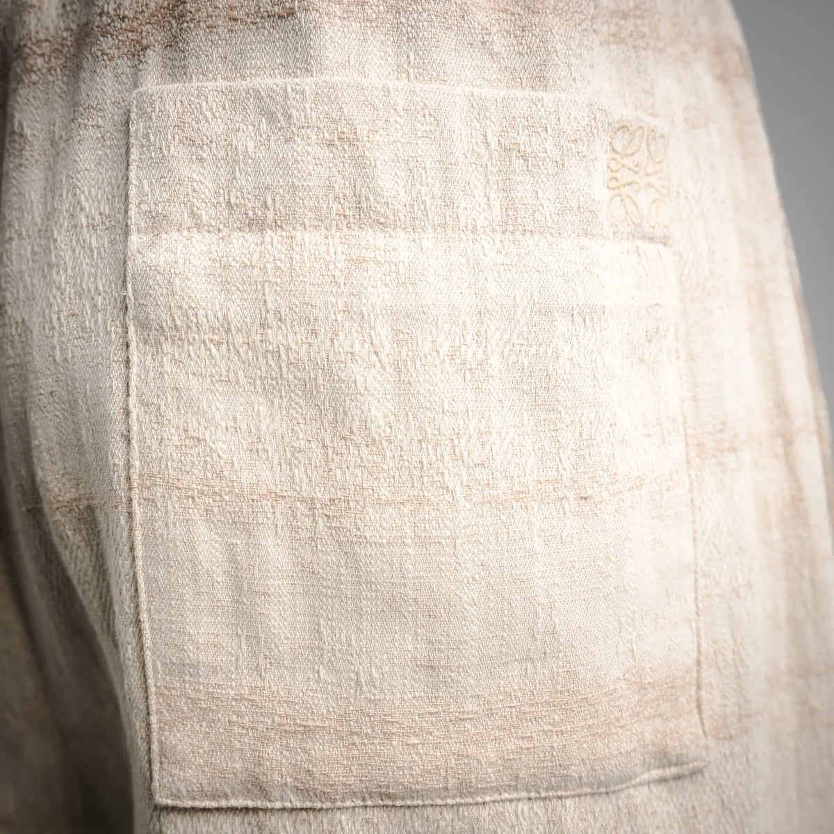 Off-white linen shorts with front patch pocket detail