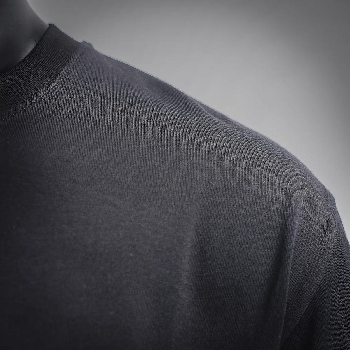 Black t-shirt fabric texture close-up