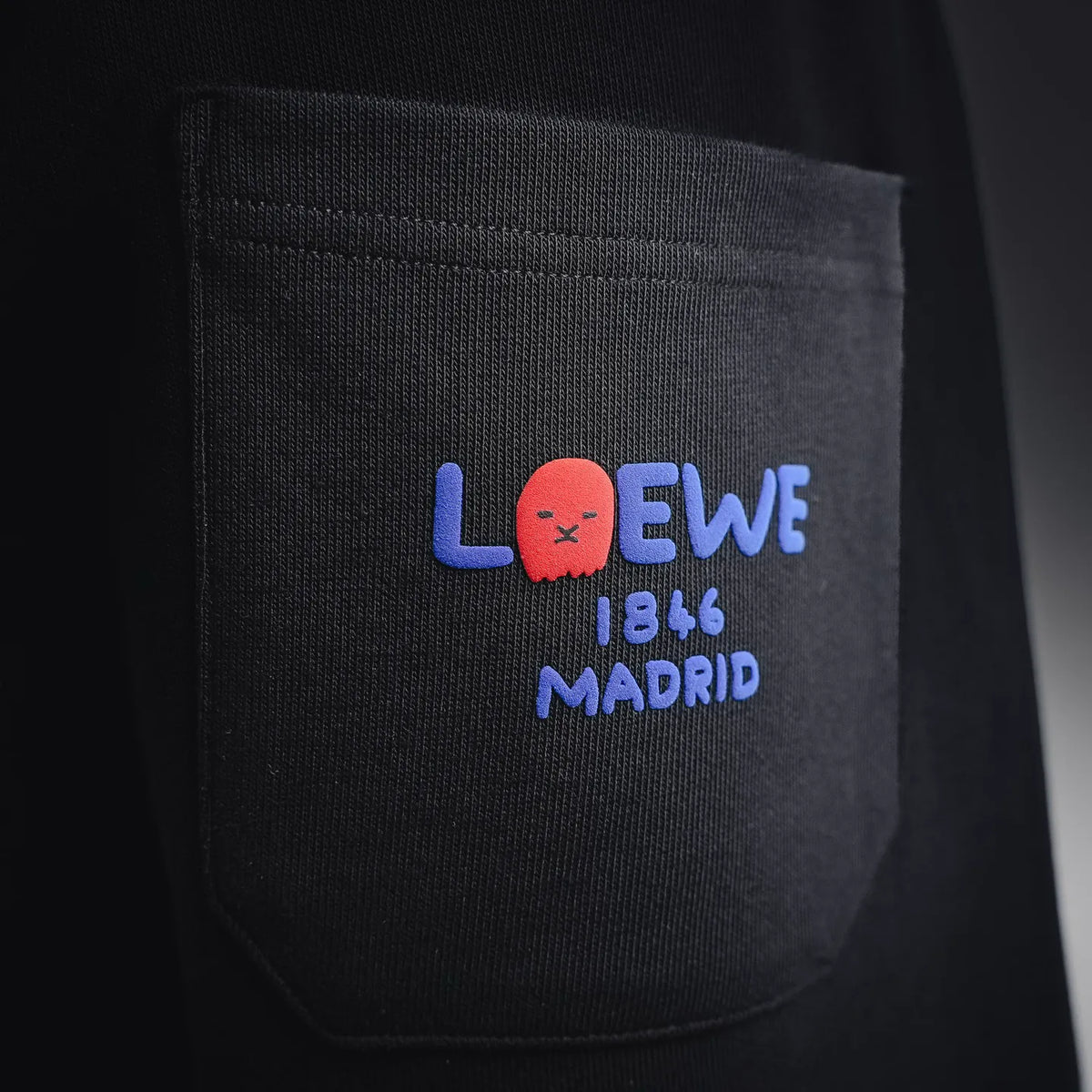 Black shorts with LOEWE Madrid 1846 logo patch on pocket