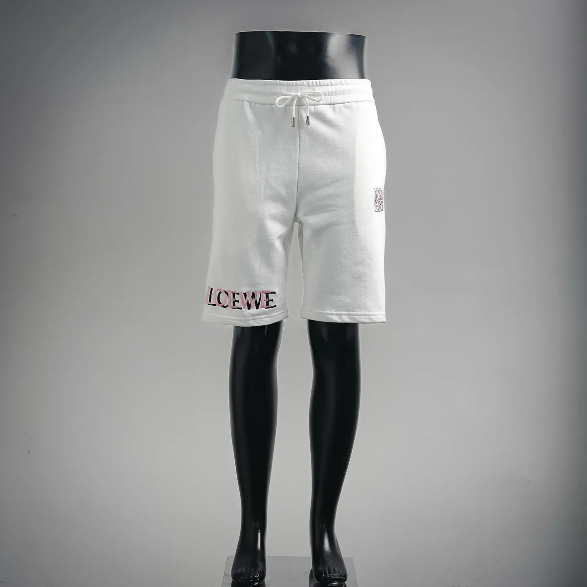 White drawstring shorts with side pockets and LOEWE logo at hem