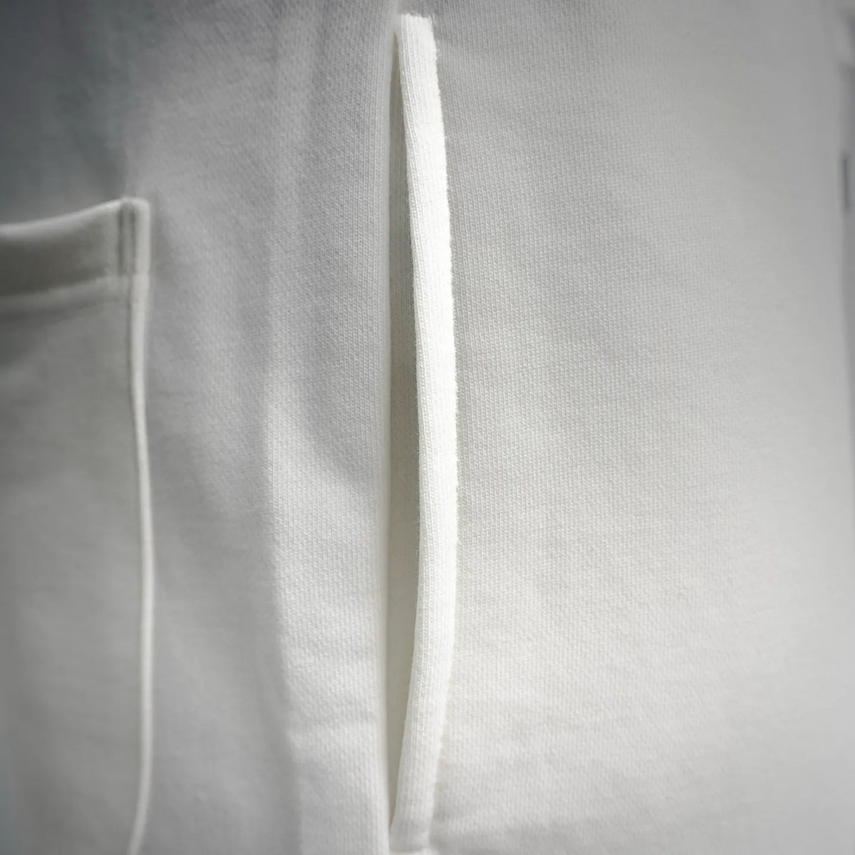 White shorts side seam and inner drawstring channel