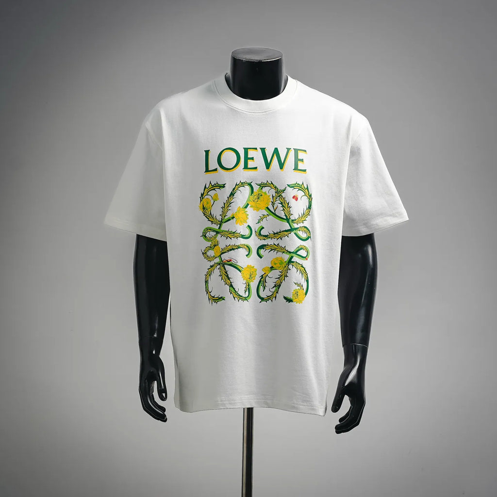 White LOEWE T-shirt with colorful garden crest graphic on chest.