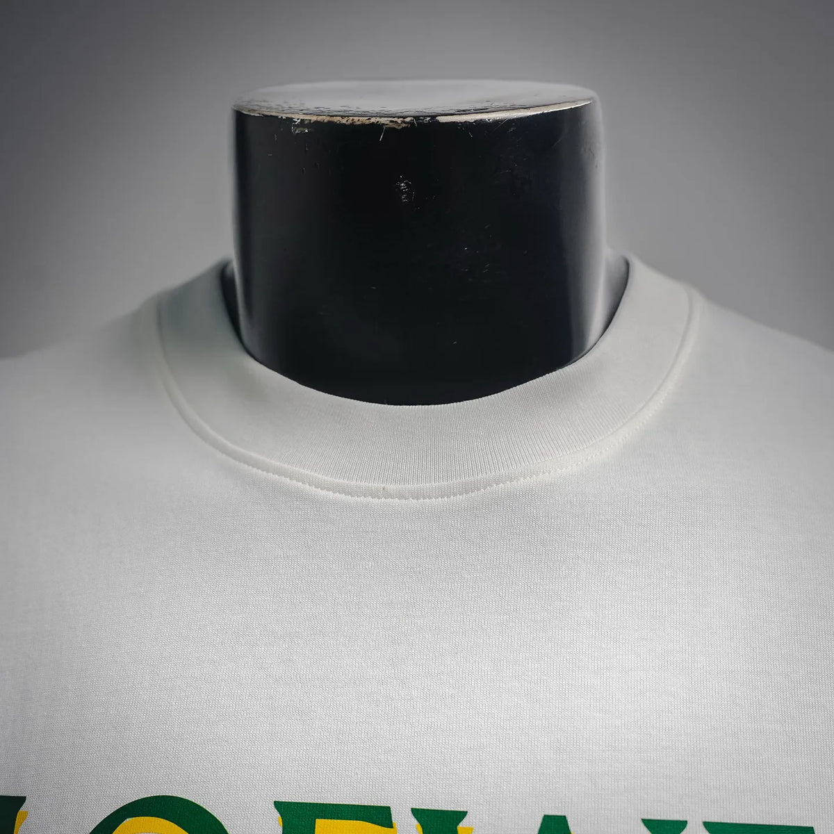 White LOEWE T-shirt neckline and crew collar close-up.