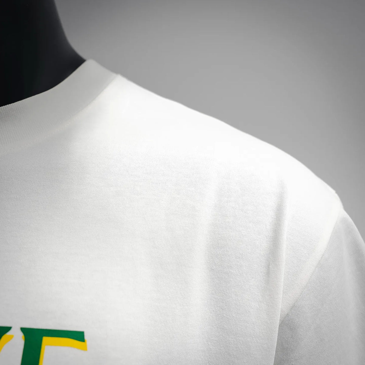 White LOEWE T-shirt shoulder and upper back seam close-up.