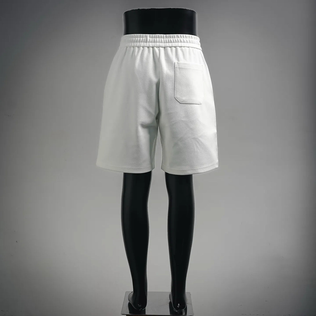 White drawstring shorts with back pocket detail