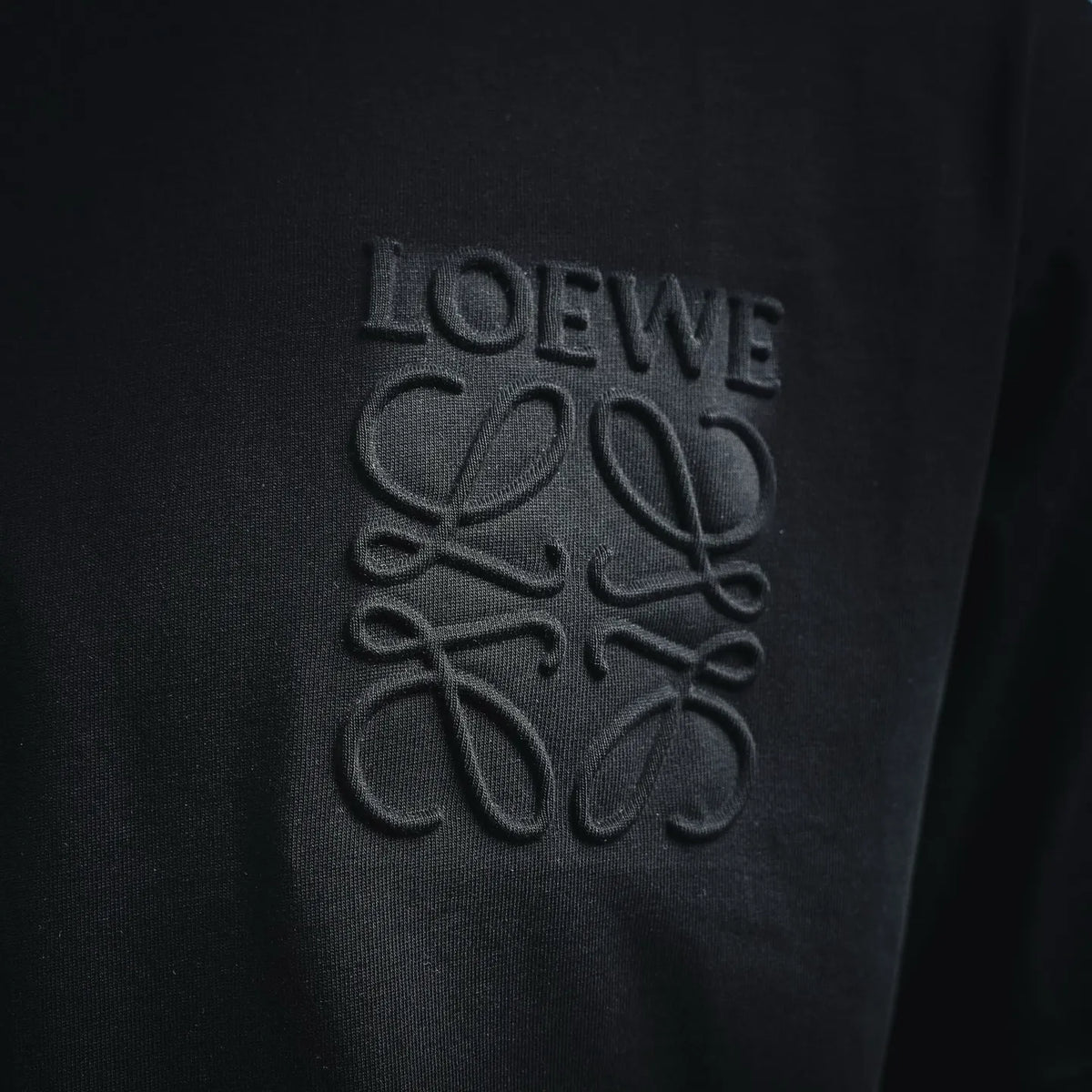 LOEWE embroidered logo on dark crewneck T-shirt chest