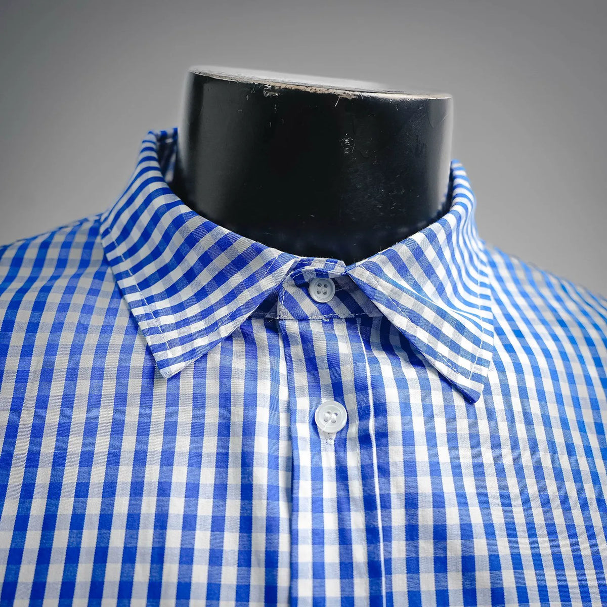 Blue and white gingham shirt collar with bow tie and button