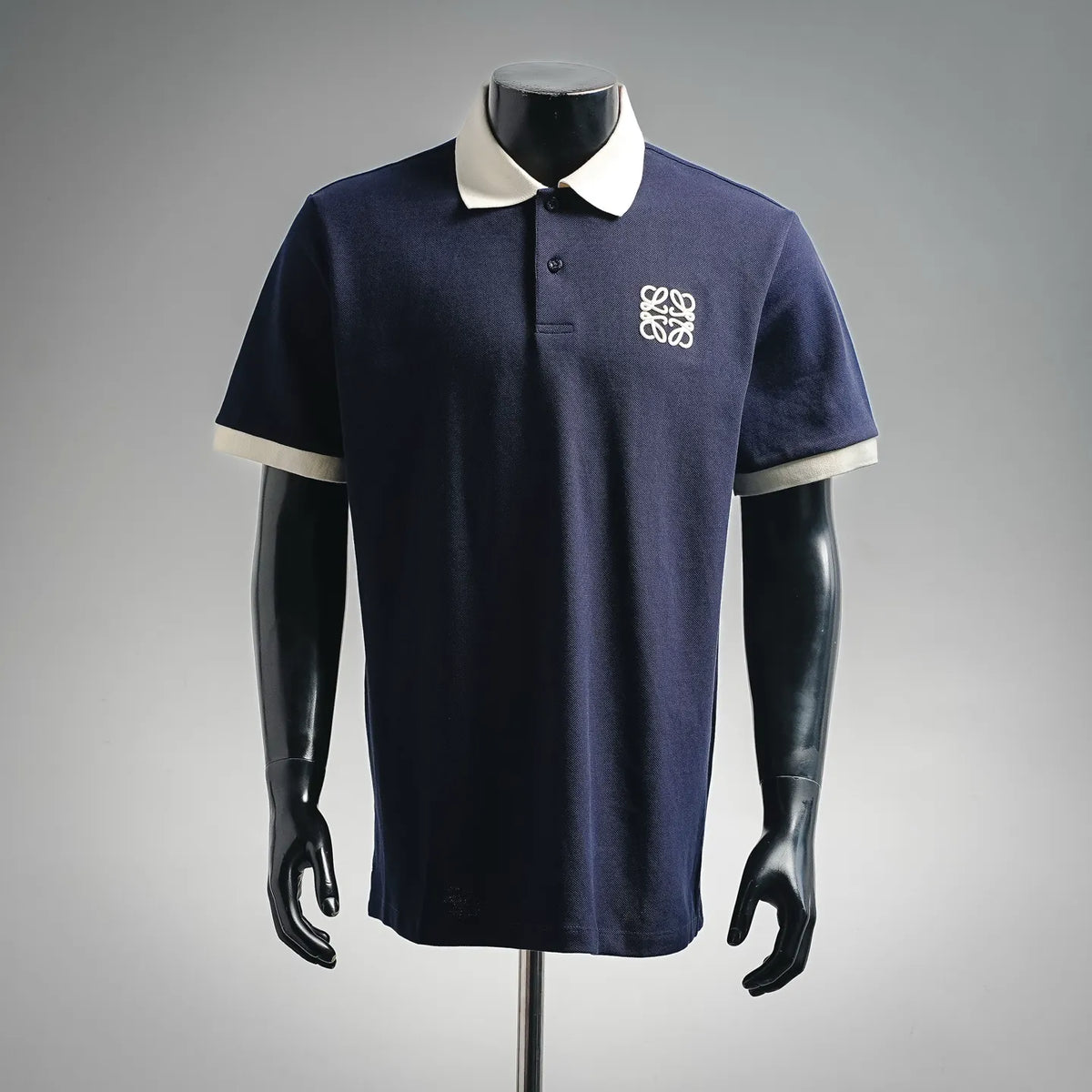Navy LOEWE polo shirt with white collar and button placket