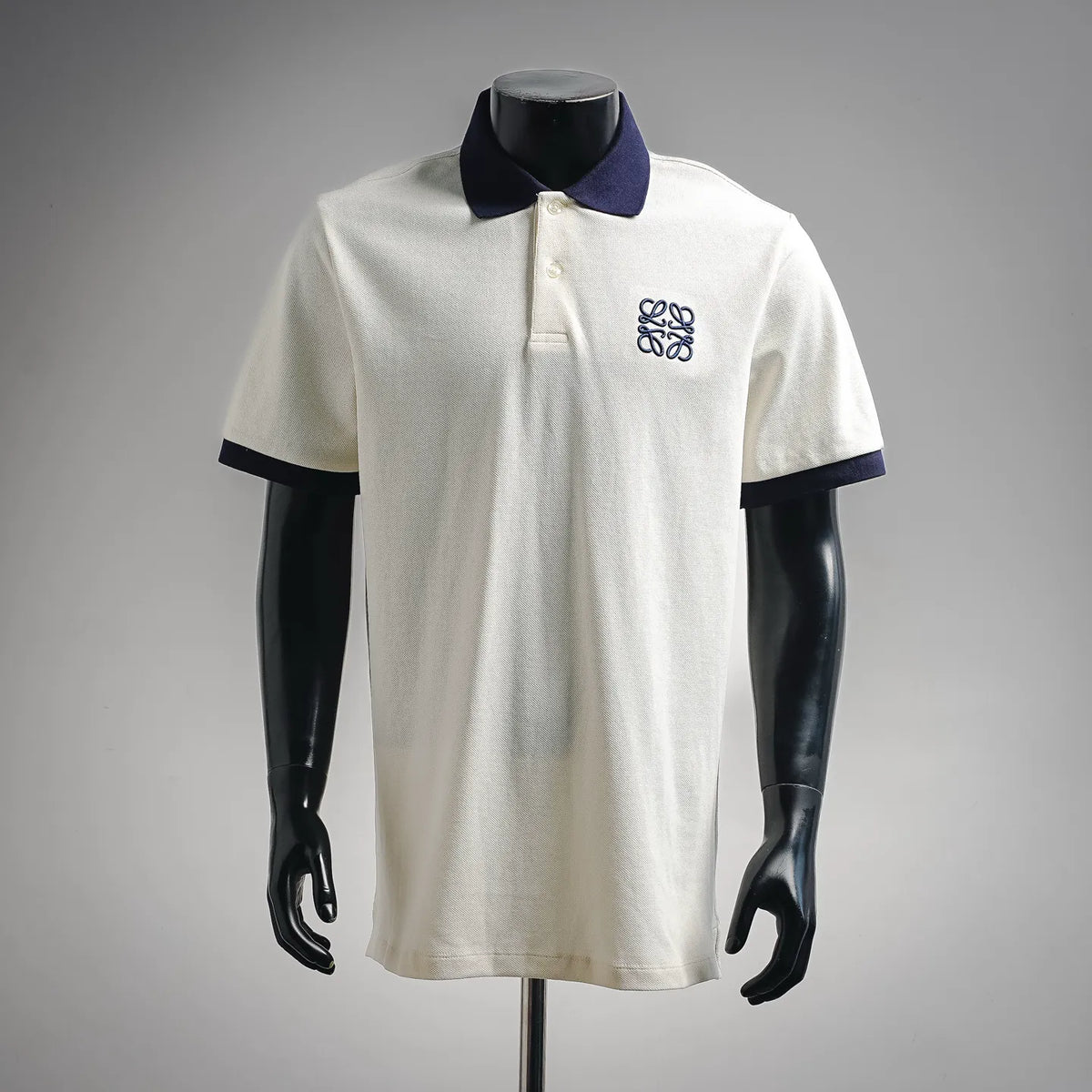 LOEWE short-sleeve polo shirt in white with navy collar and cuff, front logo embroidery