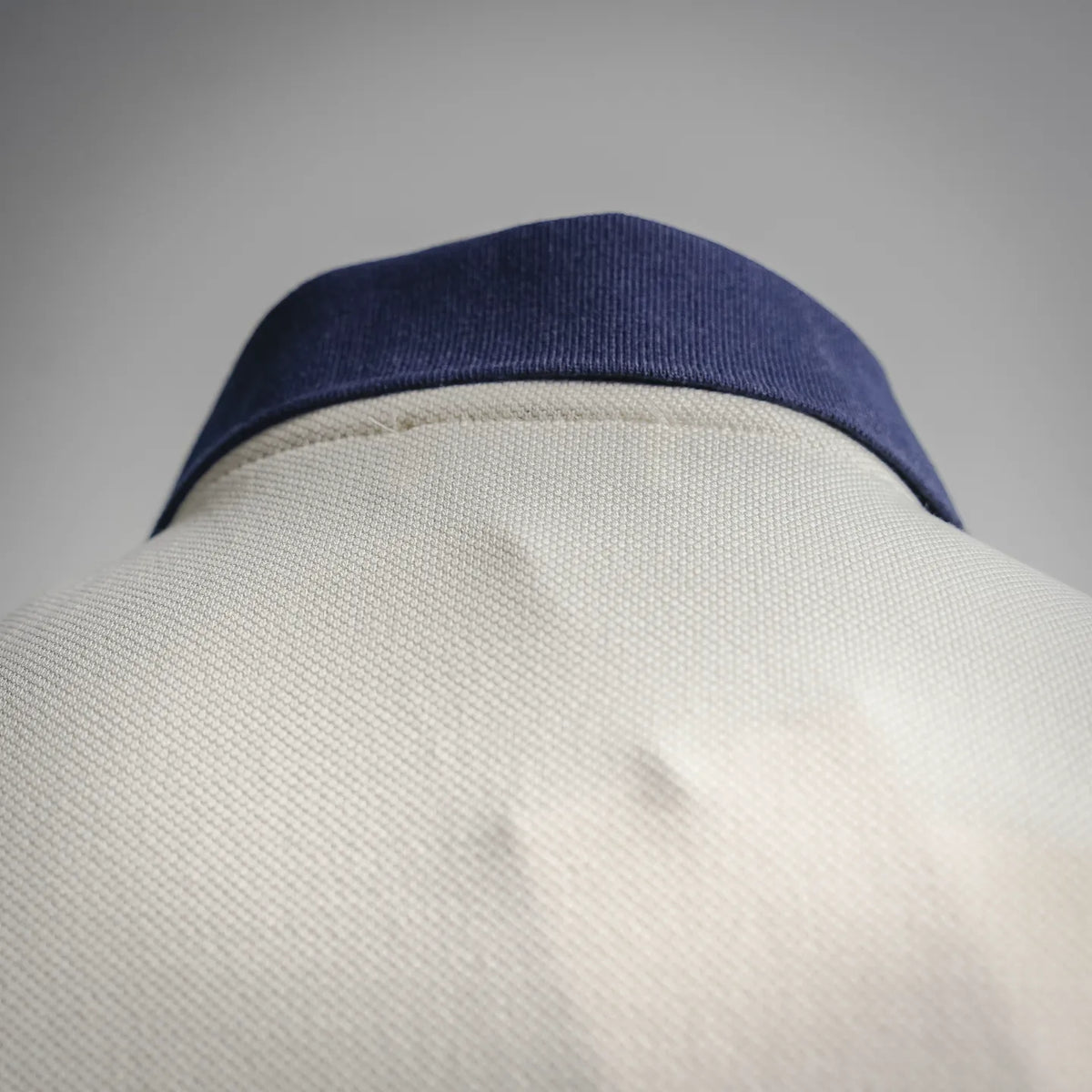 LOEWE polo shirt collar detail in navy with textured white fabric