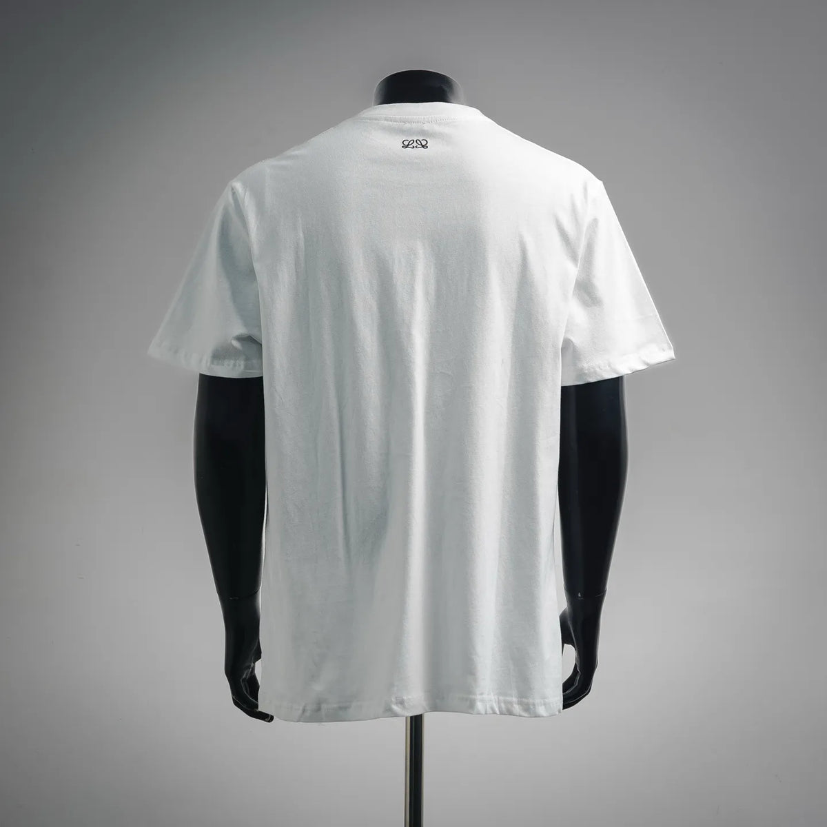 White LOEWE T-shirt on a mannequin, back view with small logo near neckline