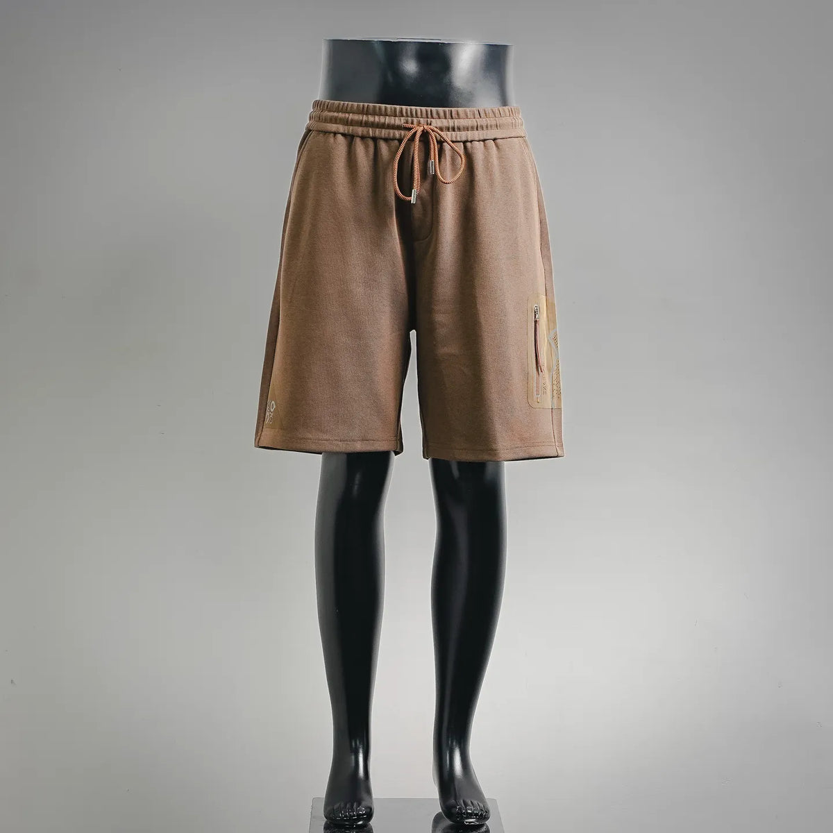 LOEWE tan cotton drawstring shorts with side graphic and patch pockets
